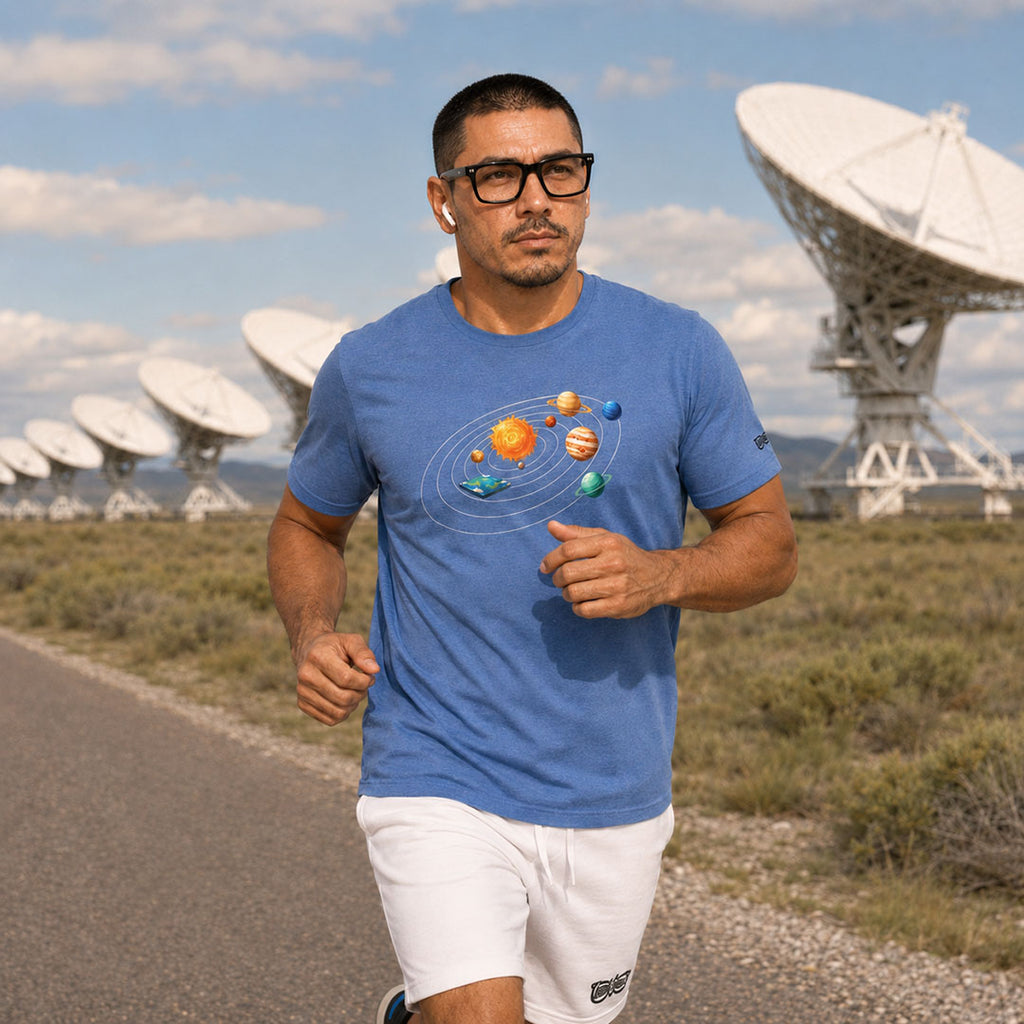 Man running on a road with satellite dishes in the background