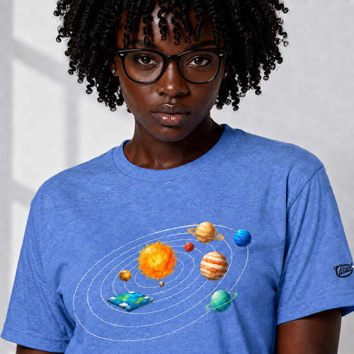 Person wearing a blue t-shirt with a solar system design on a plain background