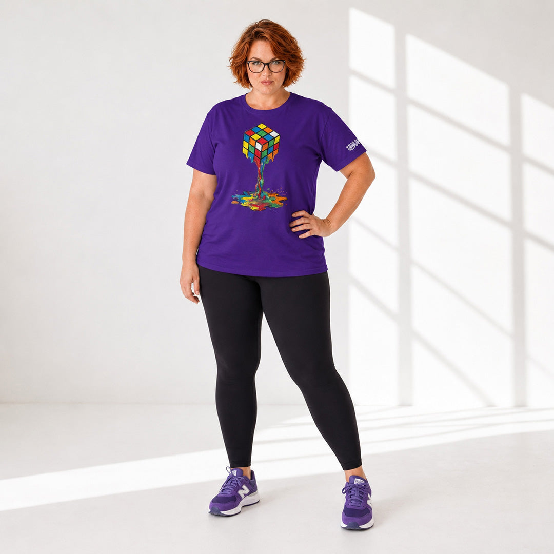 Person wearing a purple t-shirt with a colorful design, black leggings, and purple shoes in a bright room.